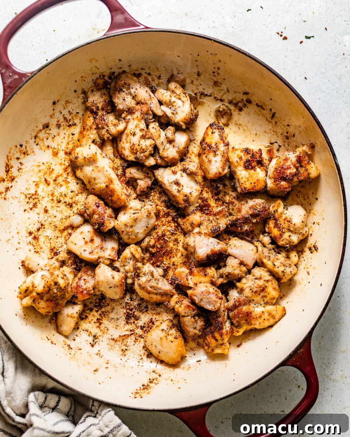 Garlic Butter Chicken Bites Recipe — Quick Savory Weeknight Meal 5 seared chicken bites in a skillet.