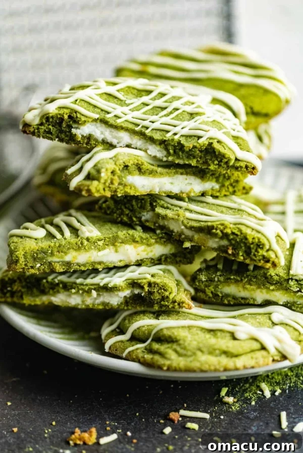 Zesty Lemon White Chocolate Chip Cookie Recipe 12 matcha cookies on a plate stacked on top of each other.