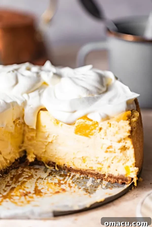 up close photo of pineapple cheesecake on a plate.