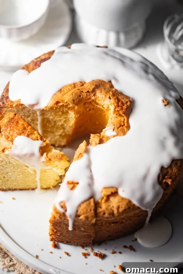 Sticky Cinnamon Roll Bundt Cake with Brown Sugar Glaze 12 mile high pound cake with vanilla glaze on top.