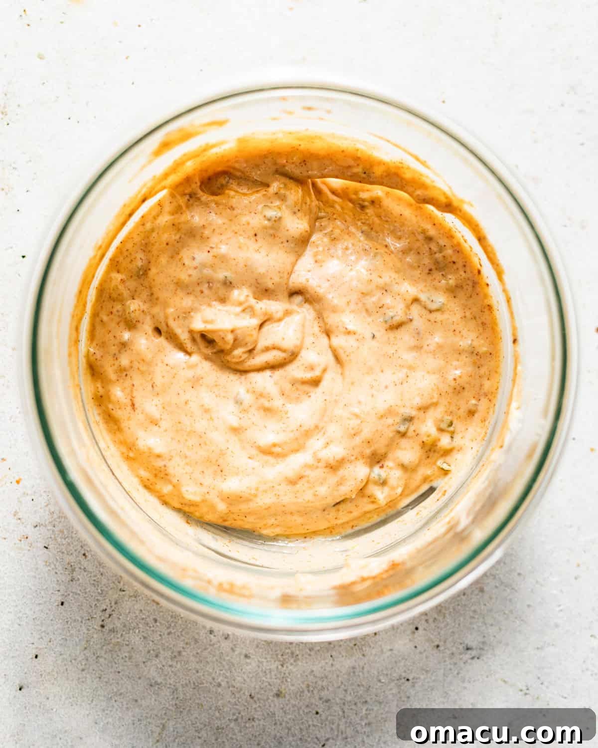 creole tartar sauce in mixed together in a bowl. 