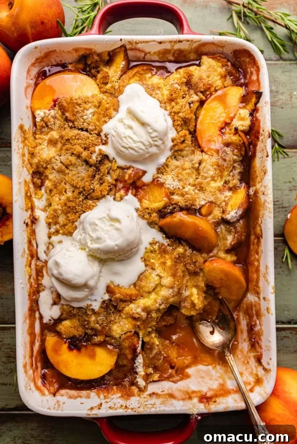 peach cobbler with cake mix in a 9x13 baking dish.
