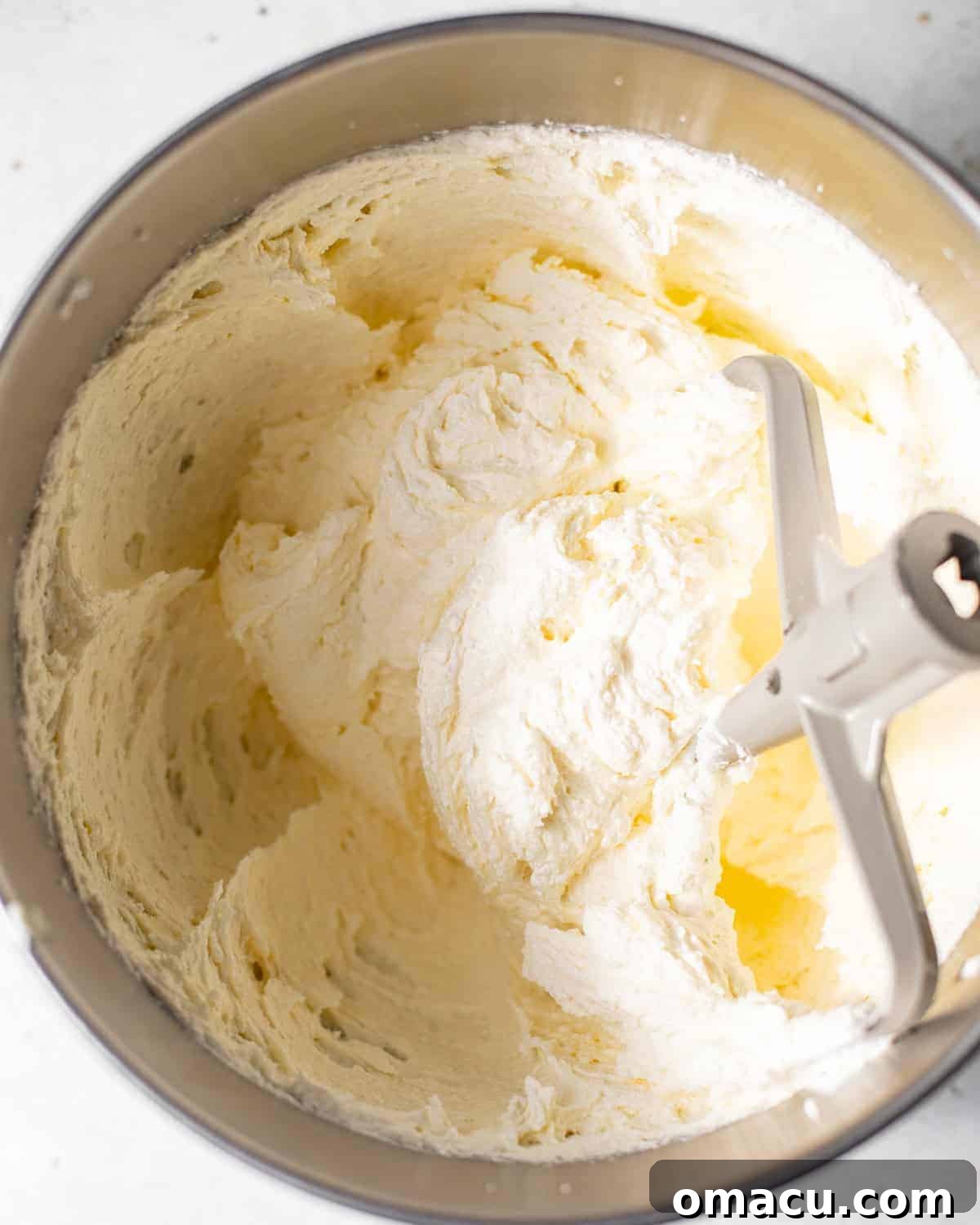 room temperature butter, vegetable oil, and sugar mixed together in the bowl of a stand mixer fitted with the paddle attachment.