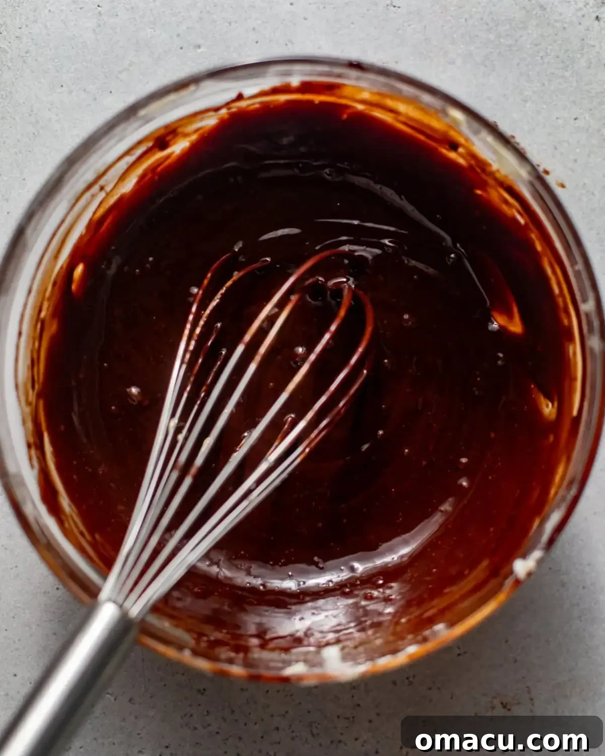 chocolate glazed whisked together in a mixing bowl.