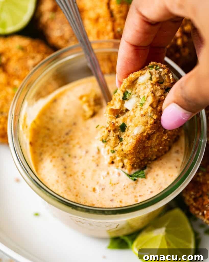 Salmon croquettes served with lime and sauce