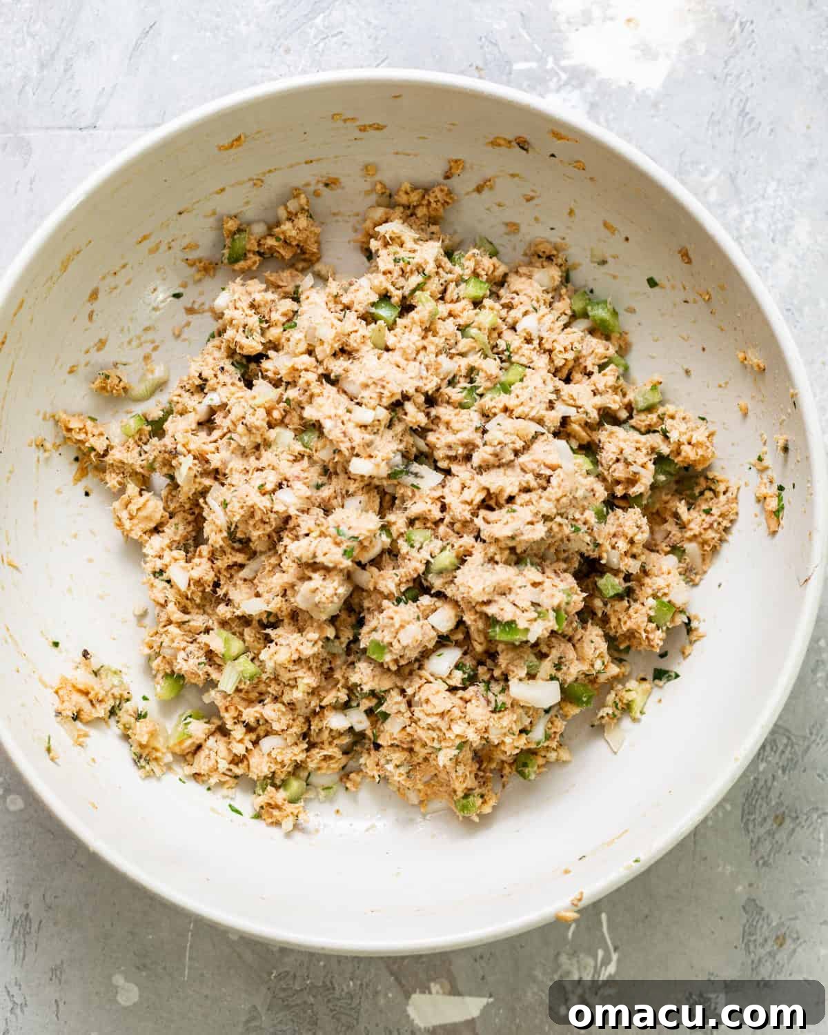 Salmon mixture with diced vegetables and parsley