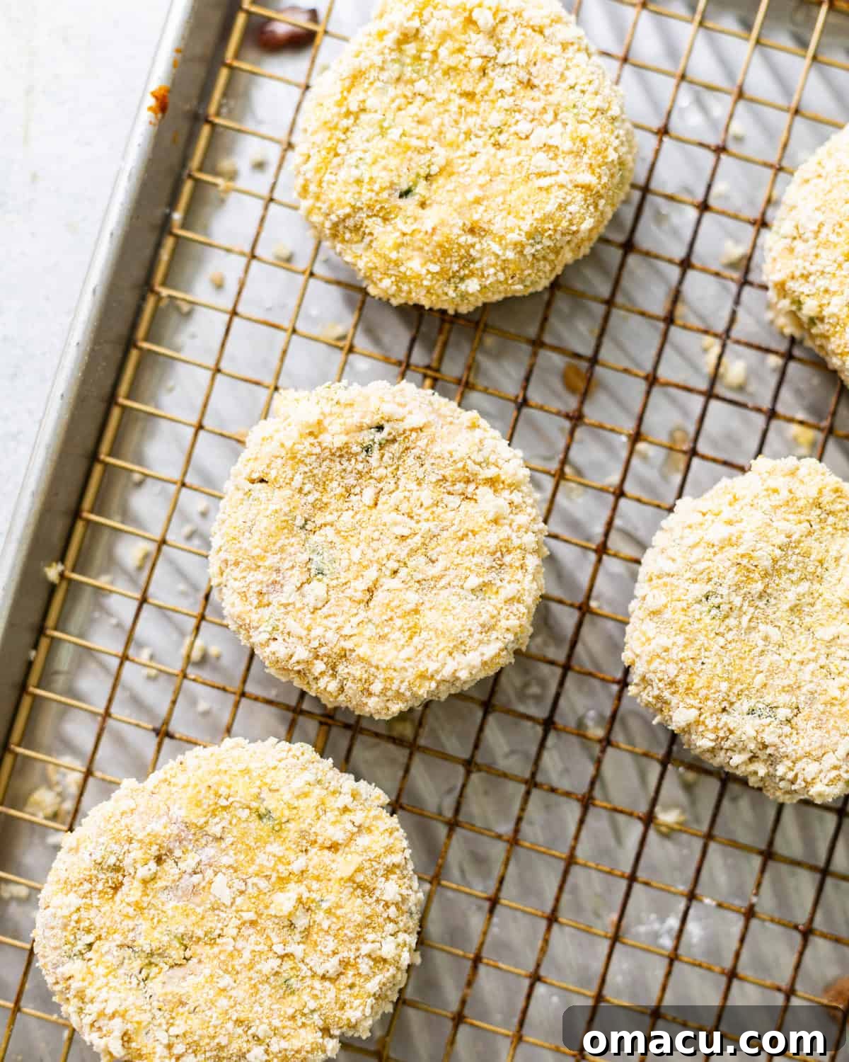 Breaded croquettes on a rack