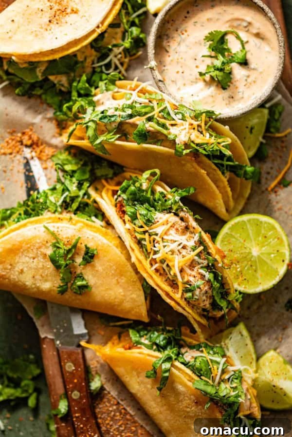 Crispy Tostones Recipe: Authentic Fried Plantains 11 cheesy gordita crunch tacos on a cutting board with spicy ranch sauce in a bowl.