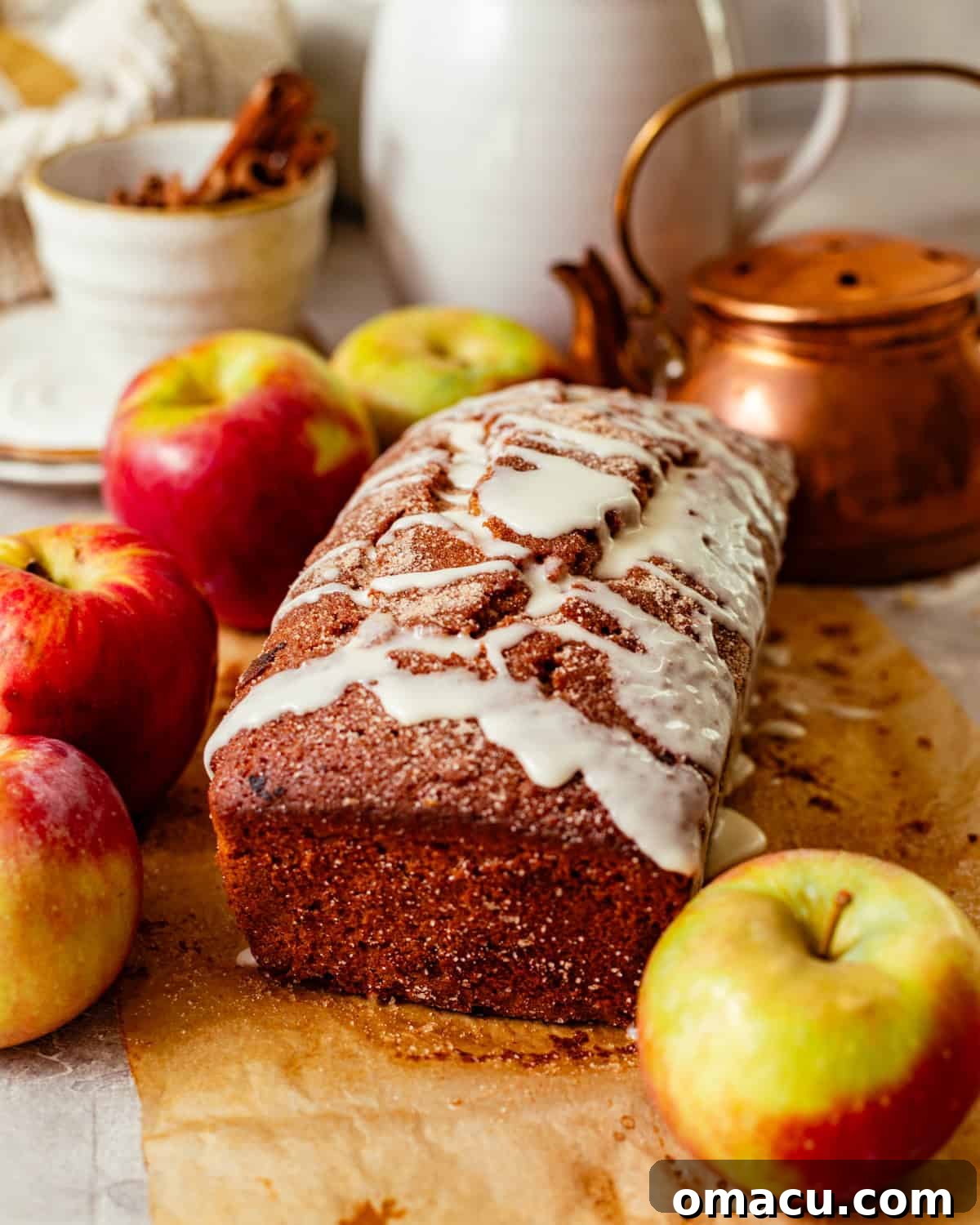 Warm Apple Cider Donut Loaf with Cinnamon Glaze 7 apple cider donut loaf covered in a apple cider glaze.